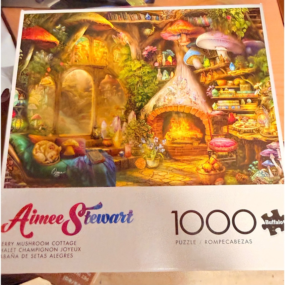 Set of 2 Aimee Stewart 1000 piece puzzles complete pre owned